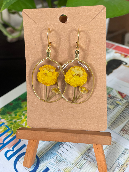 Resin circle pendant with yellow flowers