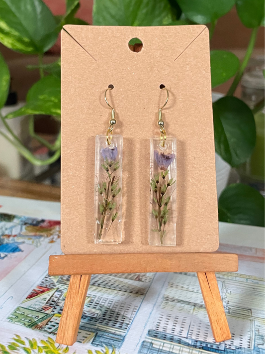 Resin pendant with purple flowers