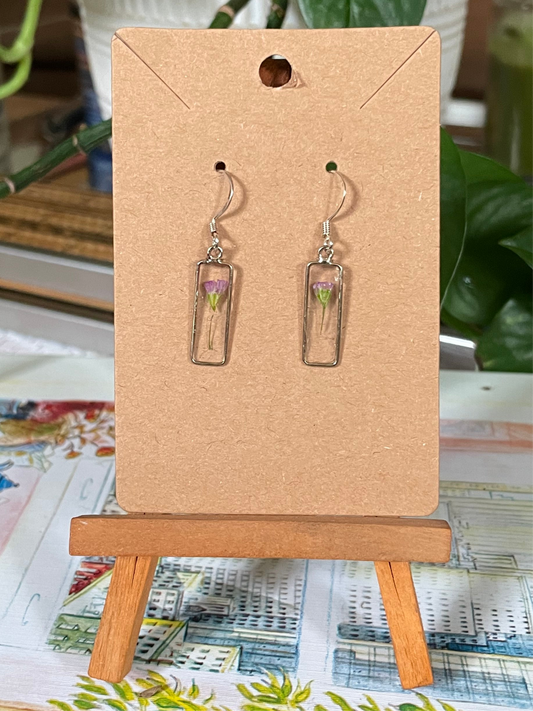 Small resin pendants with pink flowers